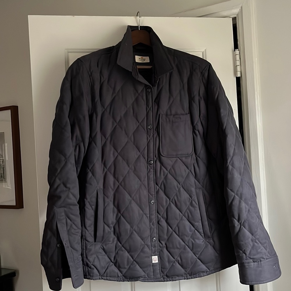 Marine Layer large quilted jacket. Chest and hip pockets. Fleece lined interior
